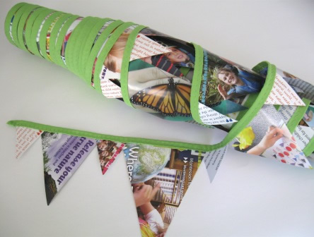Recycled bunting made from the publication, Montessori Voices as decoration for their conference dinner party